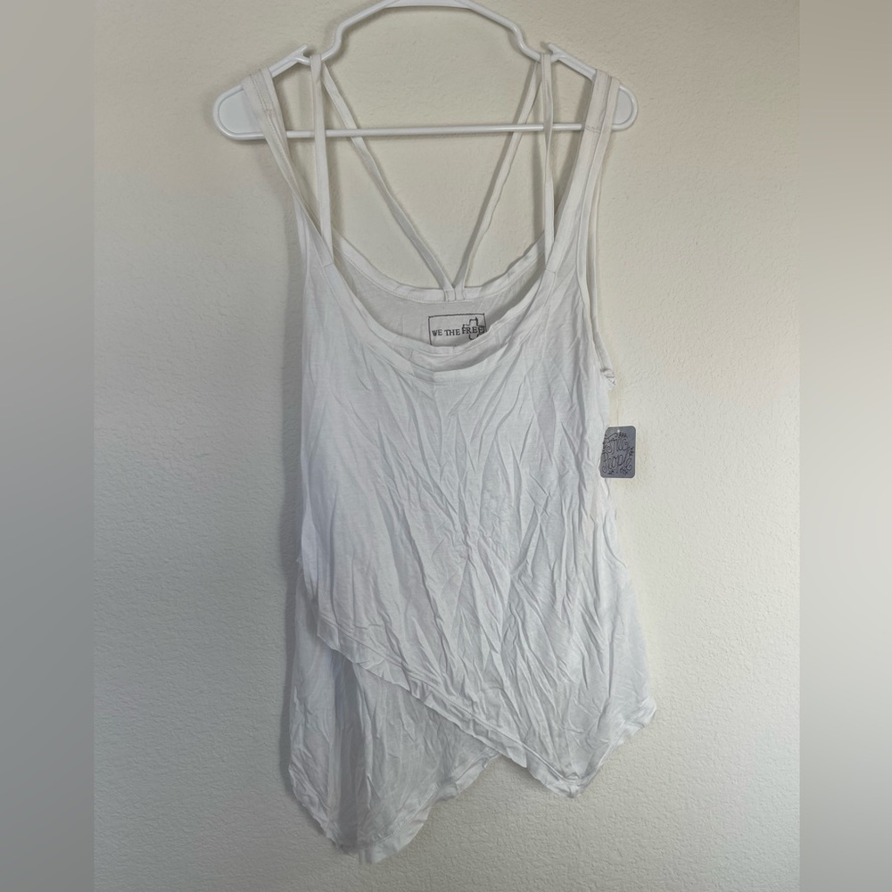 Free People Top
Color: White
Size M
BNWT